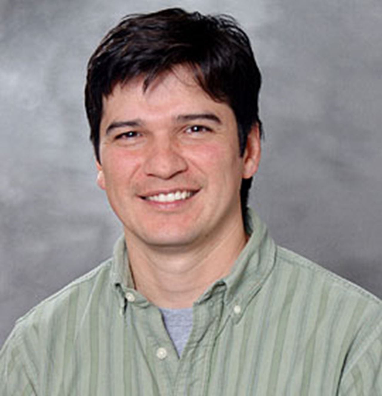 Dr. Maurico Reginato