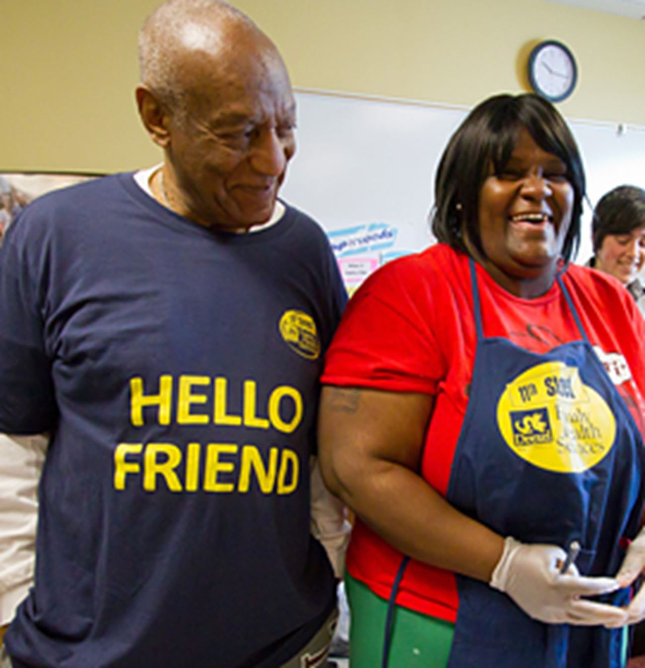 Bill Cosby interacts with 11th Street patients during his visit to a cooking class