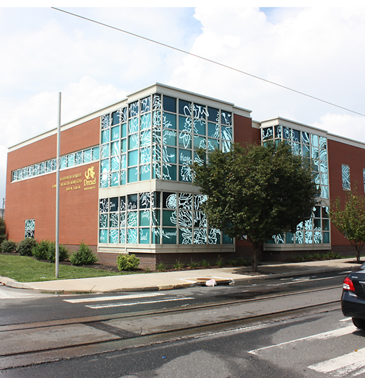 A rendering of the glass-etched drawings of medicinal plants being installed on the windows of Drexel's 11th Street Family Health Services building.