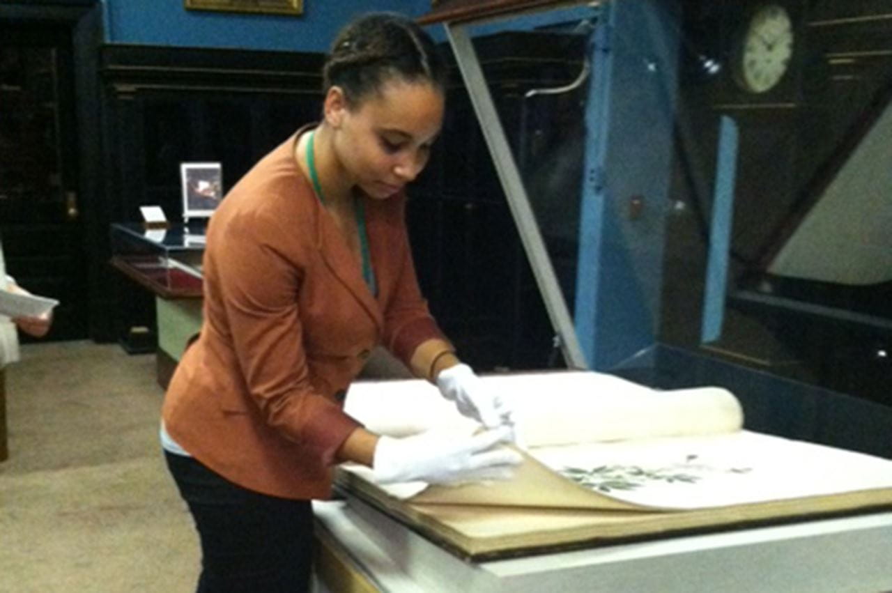 Mica Matlack turning a page