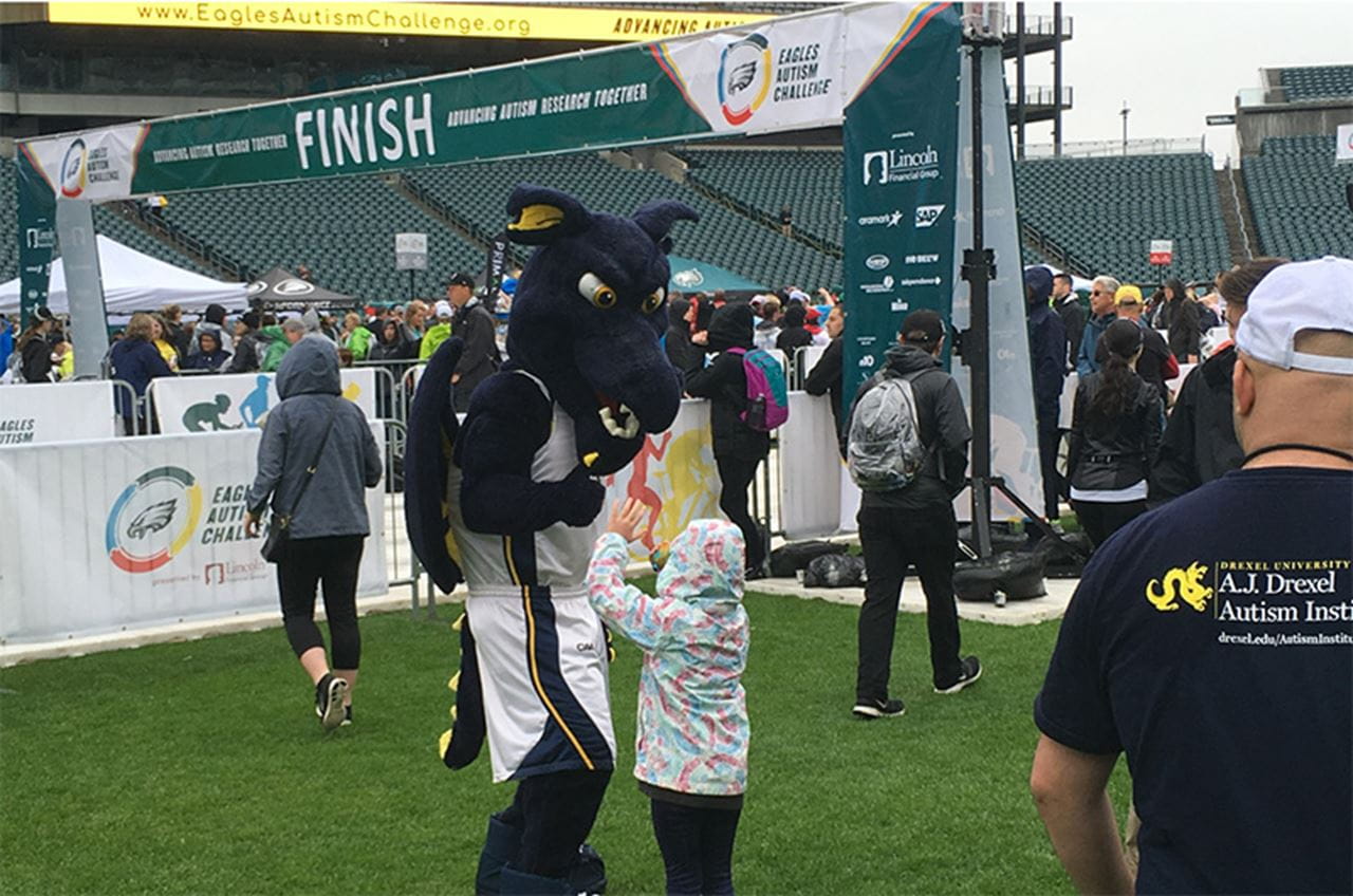 Mario the Magnificent giving a thumbs up to a little kid who's waving