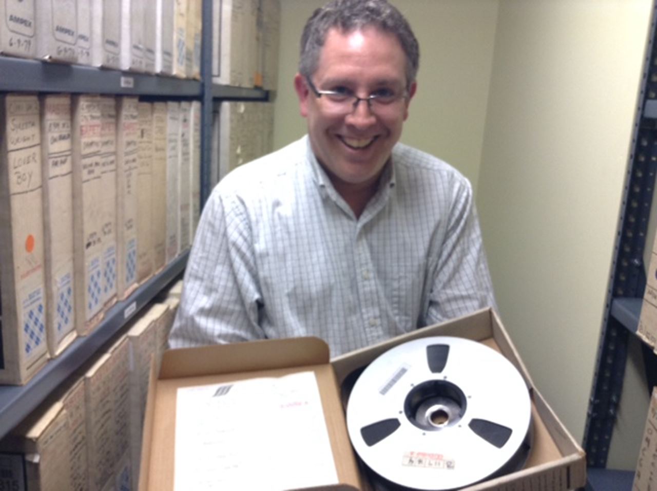 Drexel's Toby Seay, holding a David Bowie tape. Photo by Alissa Falcone.