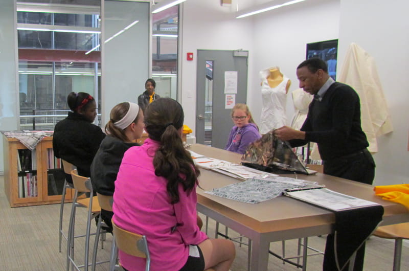Assistant Professor Alphonso McClendon, Department of Design in Westphal College of Media Arts & Design, teaching fashion design during Inspire a Child to Dream Day.