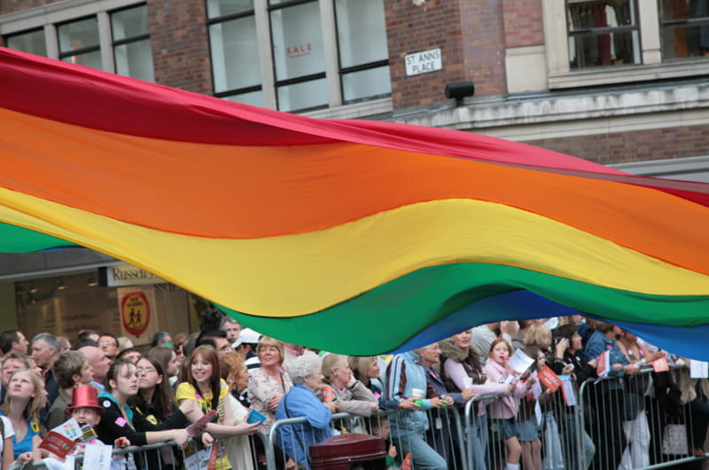 Rainbow Flag during a Pride event. Photo by Jez Atkinson.