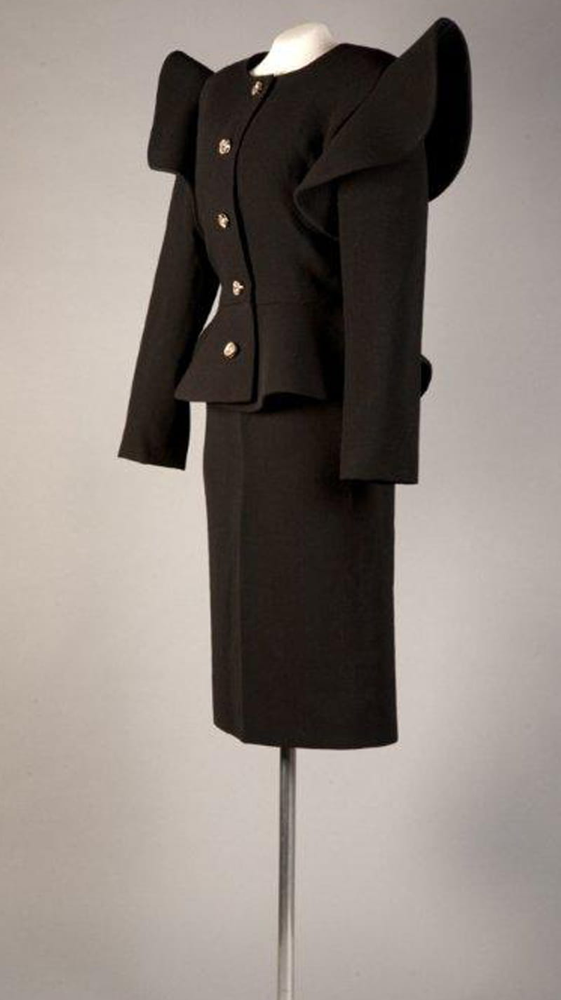 Pierre Cardin, black wool crepe, c. 1983, France. Gift of Katherine Field.