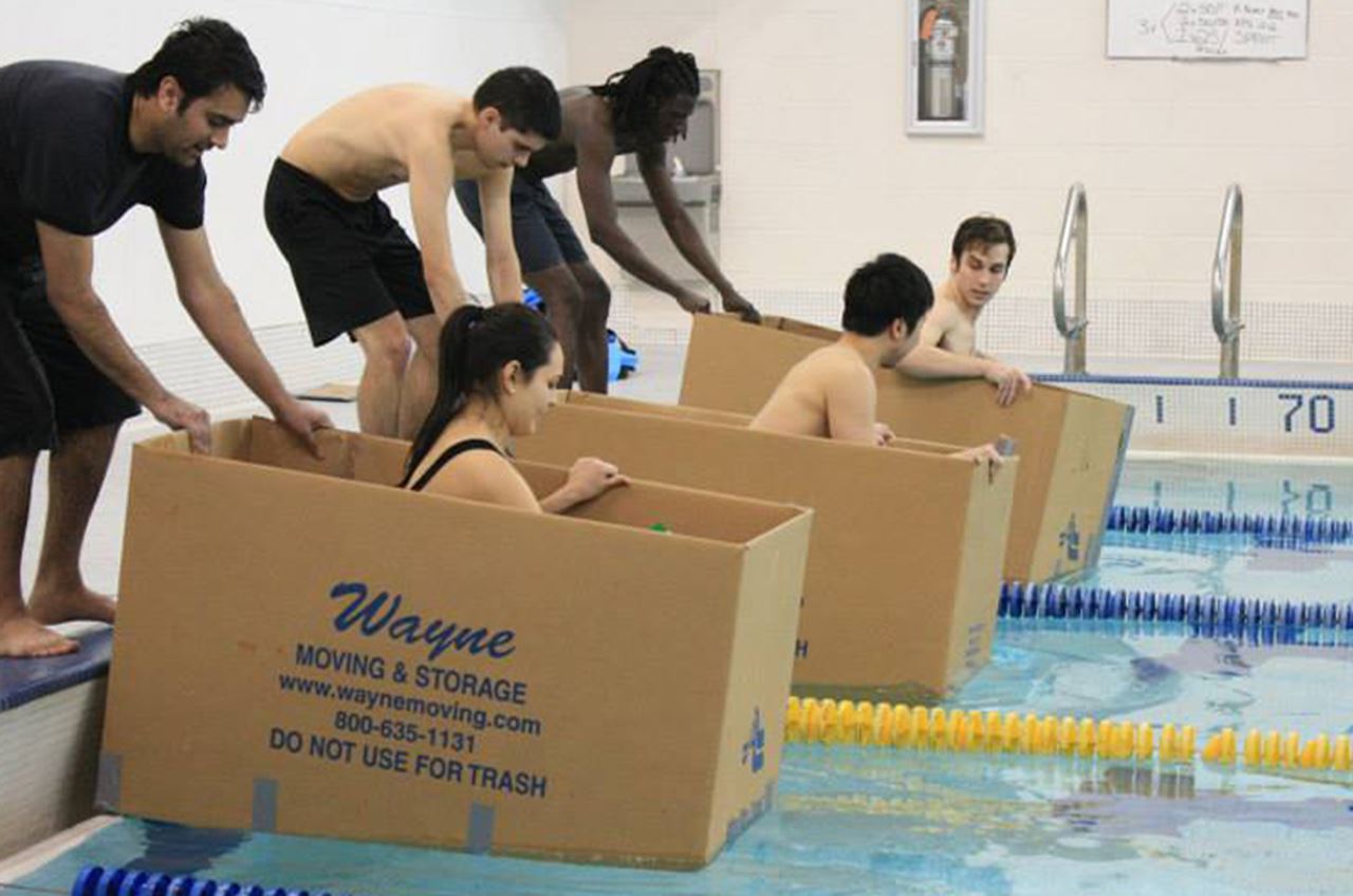 A team of boaters gets set for an attempt across the DAC pool. Courtesy of Drexel Recreational Athletics.