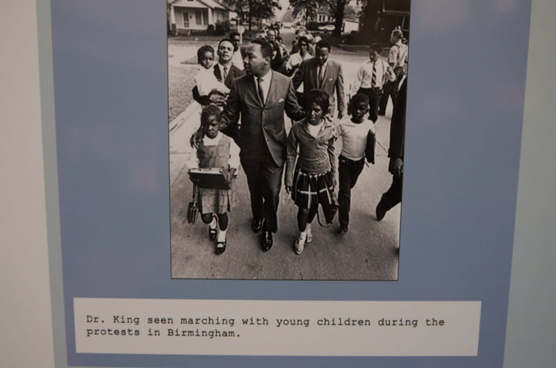 A photo in the "Children, Youth and Civil Rights" exhibit depicting Martin Luther King Jr.