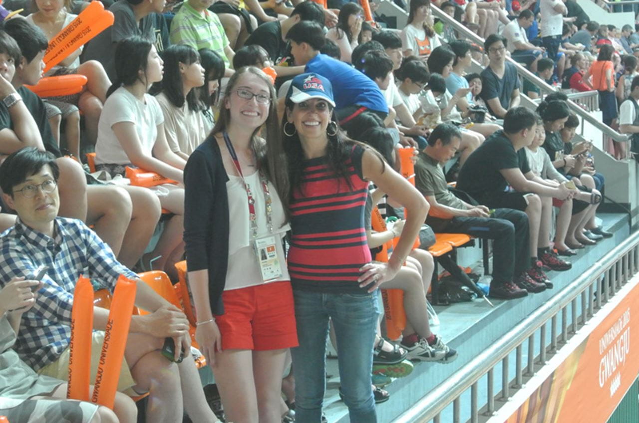 Erin Sheridan catching up with Drexel faculty member Nyree Dardarian at the Men’s Basketball Semifinals at the World University Games. Photo credit: Drexel Athletics.