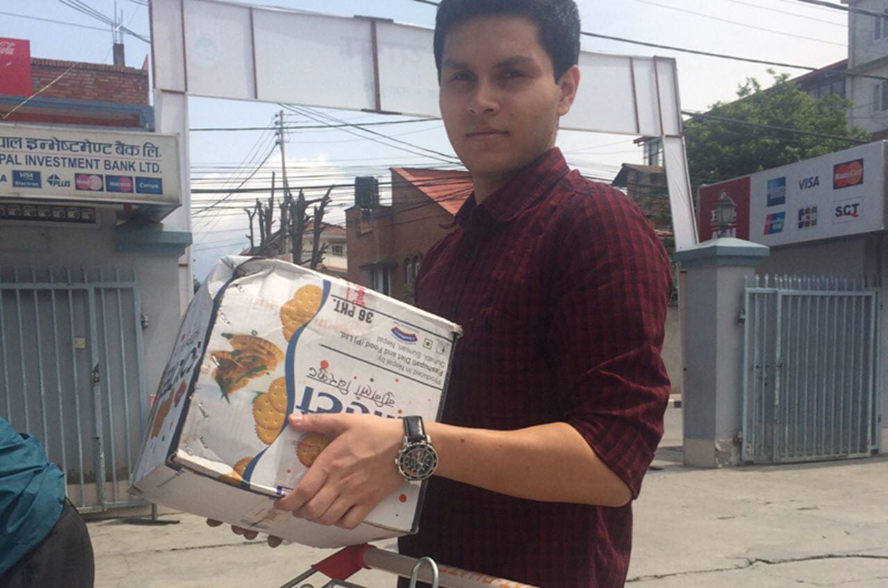 Ashish Timilsina working to help earthquake survivors in Nepal.