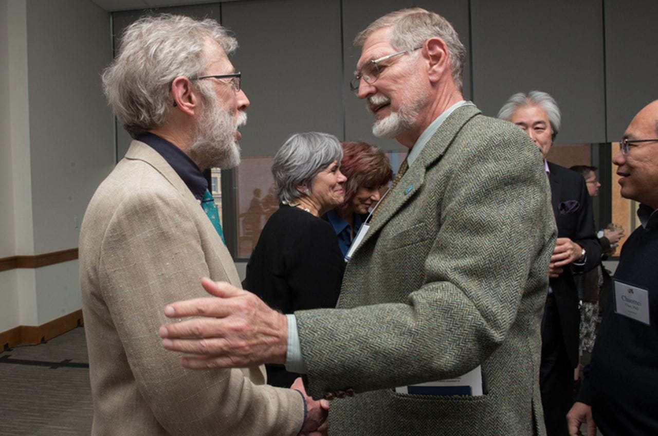 Drexel authors Anthony Addison, PhD, chemistry professor in the College of Arts and Sciences, (left) with Roger McCain, PhD, economics professor in the LeBow College of Business (right). By Jaci Downs Photography.