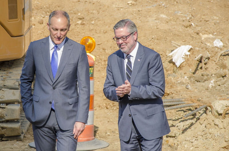 Drexel President John Fry and Paul McGrowan of The Study Hotels tour the site of teh future hotel on Drexel's campus