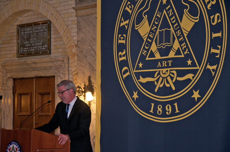 President John A. Fry speaking at the celebration of the Liberty Scholars set to finish their degrees in 2015. Fry told those gathered to support the students that they "must be bursting with pride."