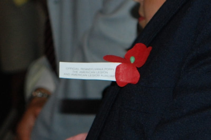 A poppy worn for Memorial Day on the jacket of a Drexel Memorial Day Primer attendee.