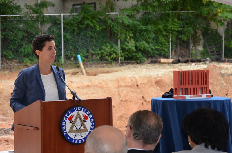 Rabbi Isabel de Koninck, leader of Hillel of Drexel University, speaks about Jewish life at Drexel in front of the site for the building that will become the organization's home.