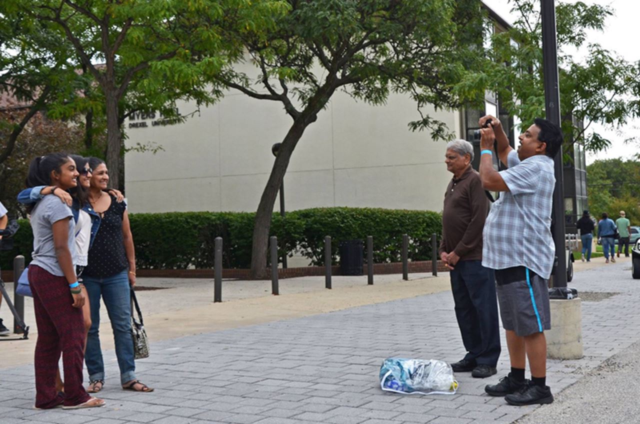 Taking the first family picture on campus.