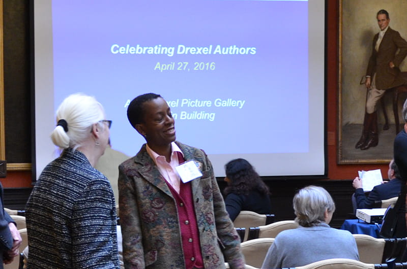 Ann Yurcaba chats with April James before the Celebrating Drexel Authors event.