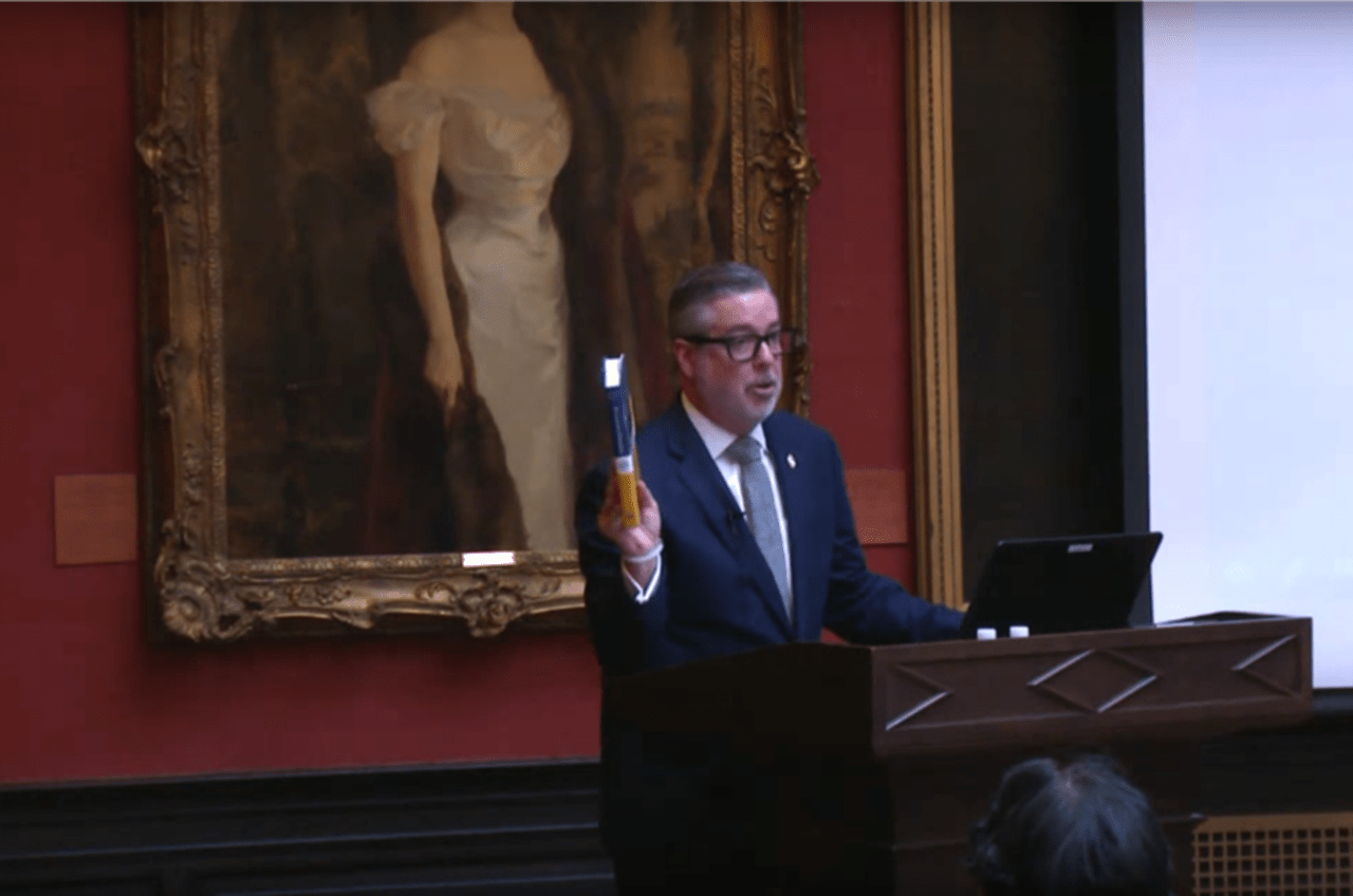 President John A. Fry speaks at a lecture on Drexel's history