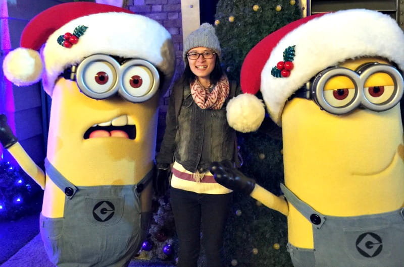 Danielle Chen poses with Minions from the Despicable Me franchise. Her co-op employer Hasbro makes many Minion-themed toys and games. 