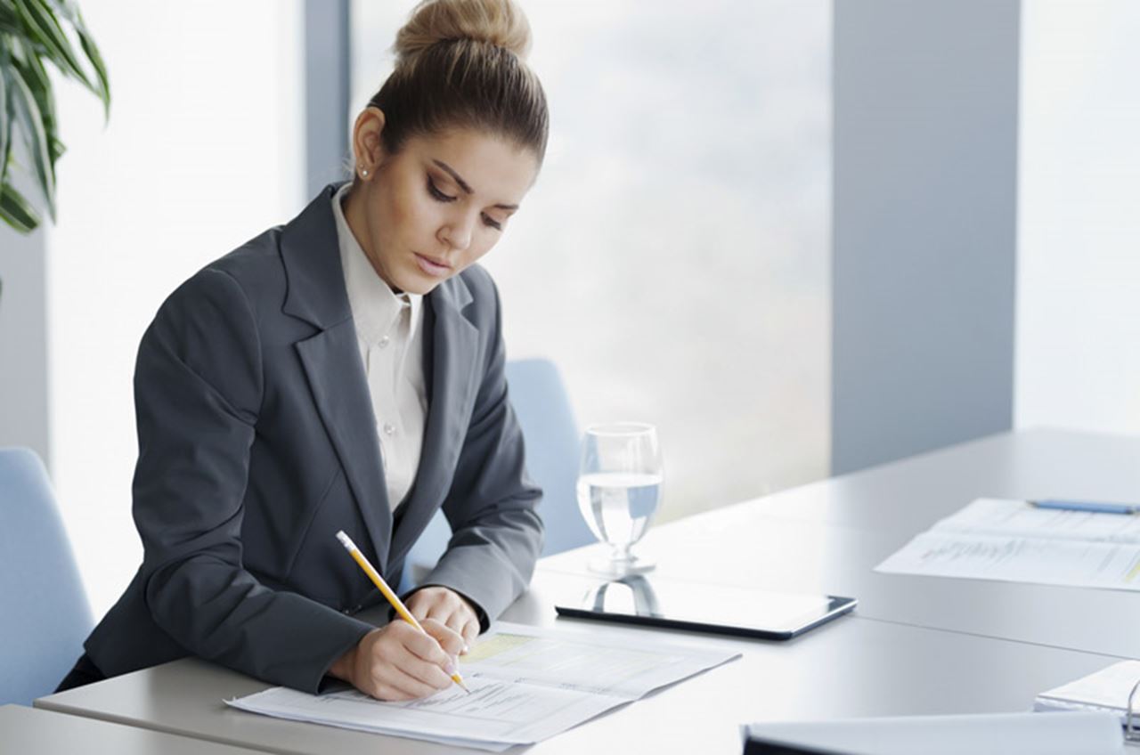 Woman filling out a form