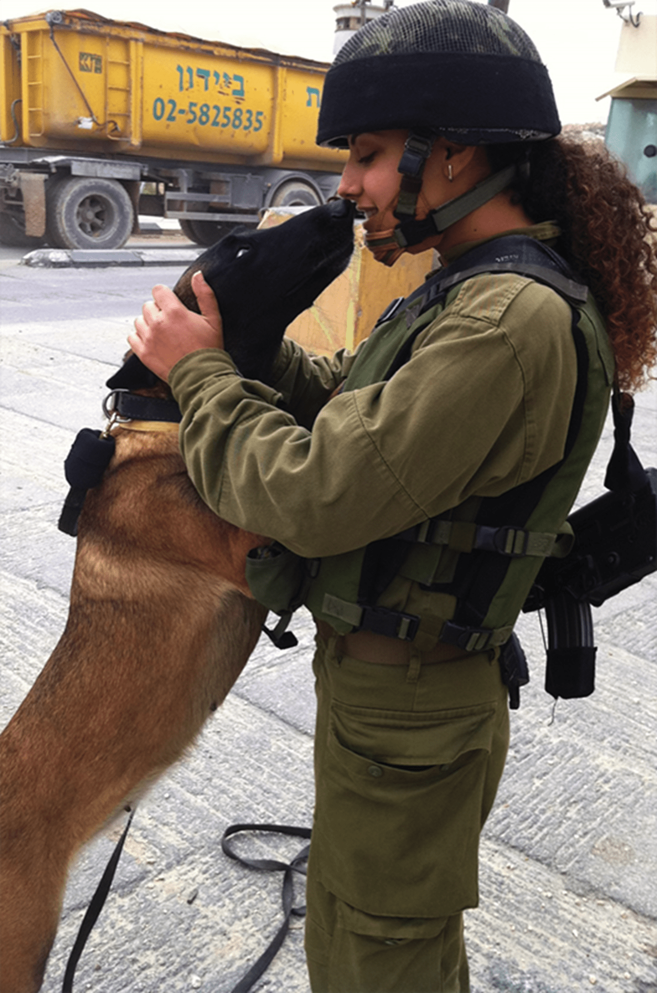 Shoval Dorani and Gula share a moment between patrols