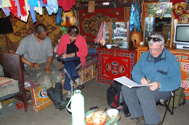 Tuya and Clyde Goulden administering a survey about perceptions of climate change with a nomadic herder named Nyamochir in Mongolia. Photo by Lkhagva Ariuntsetseg.