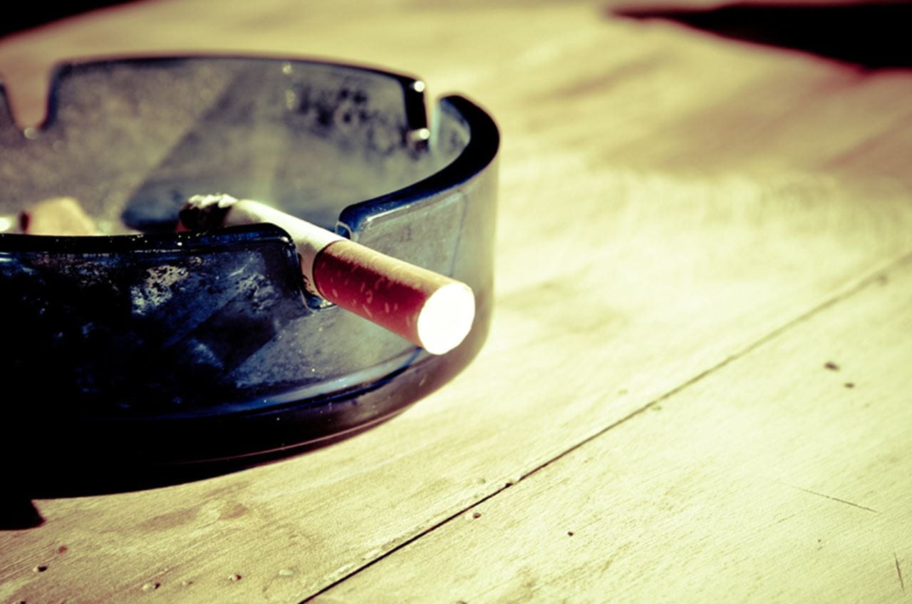 A cigarette in an ashtray