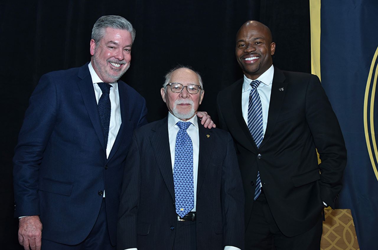 From left to right: President John Fry; Edwin Gerber, PhD; and Executive Vice President and Nina Henderson Provost M. Brian Blake, PhD, at the luncheon.