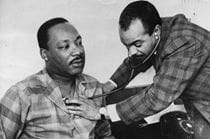 Martin Luther King Jr. being treated by Walter P. Lomax Jr. in his Philadelphia hotel room on Feb. 10, 1968.