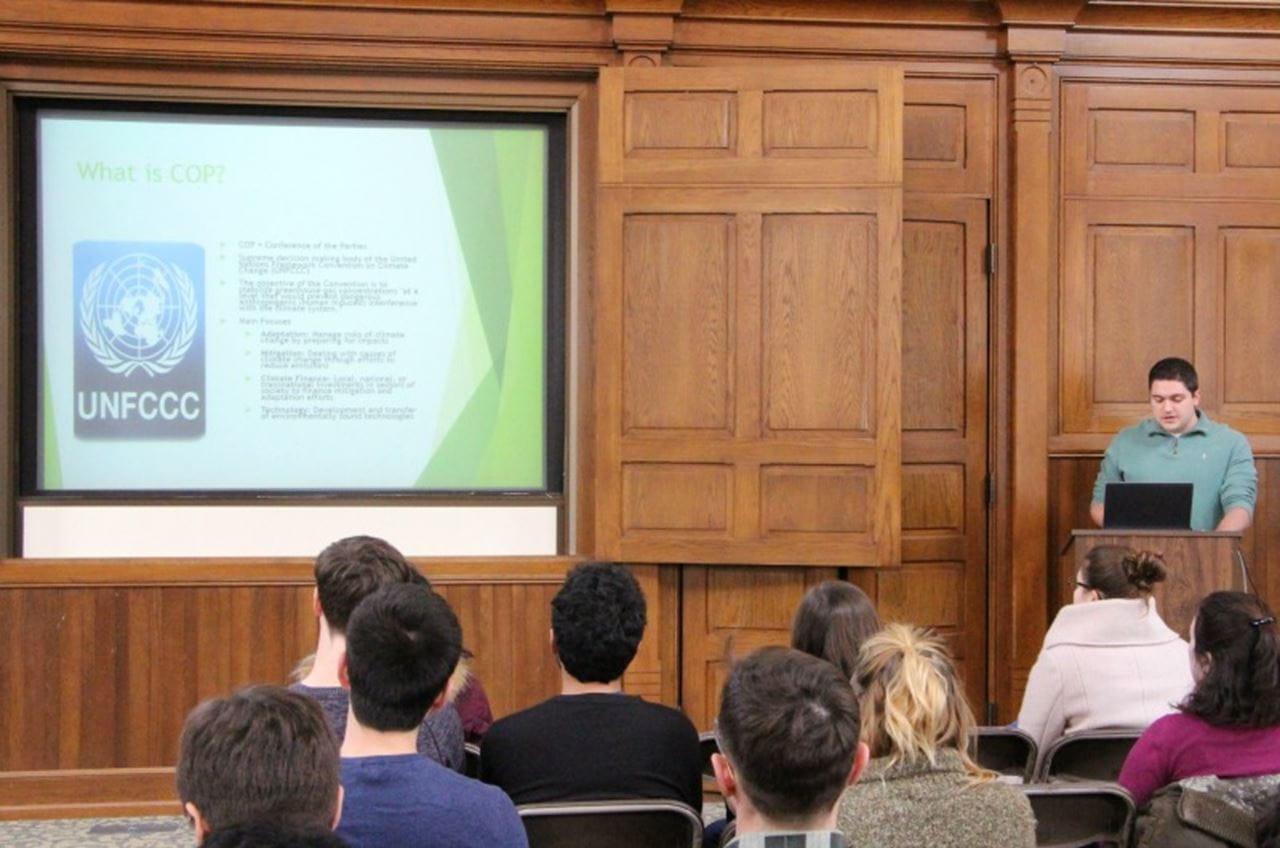 Dalton George presents findings from the global climate change conference.