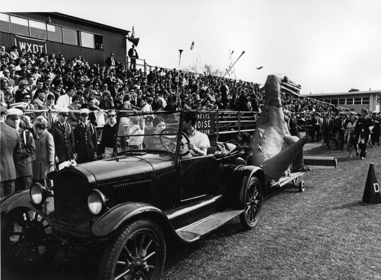 A Drexel Dragon tows a dragon display in a Homecoming parade in 1970. Photo courtesy University Archives.