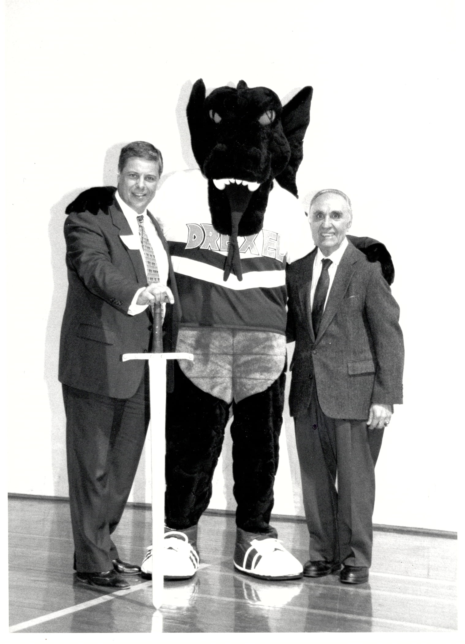 President Constantine Papdakis, left, with Mario the Magnificent and his namesake, Mario V. Mascioli ’45, in 1997. Photo courtesy University Archives.
