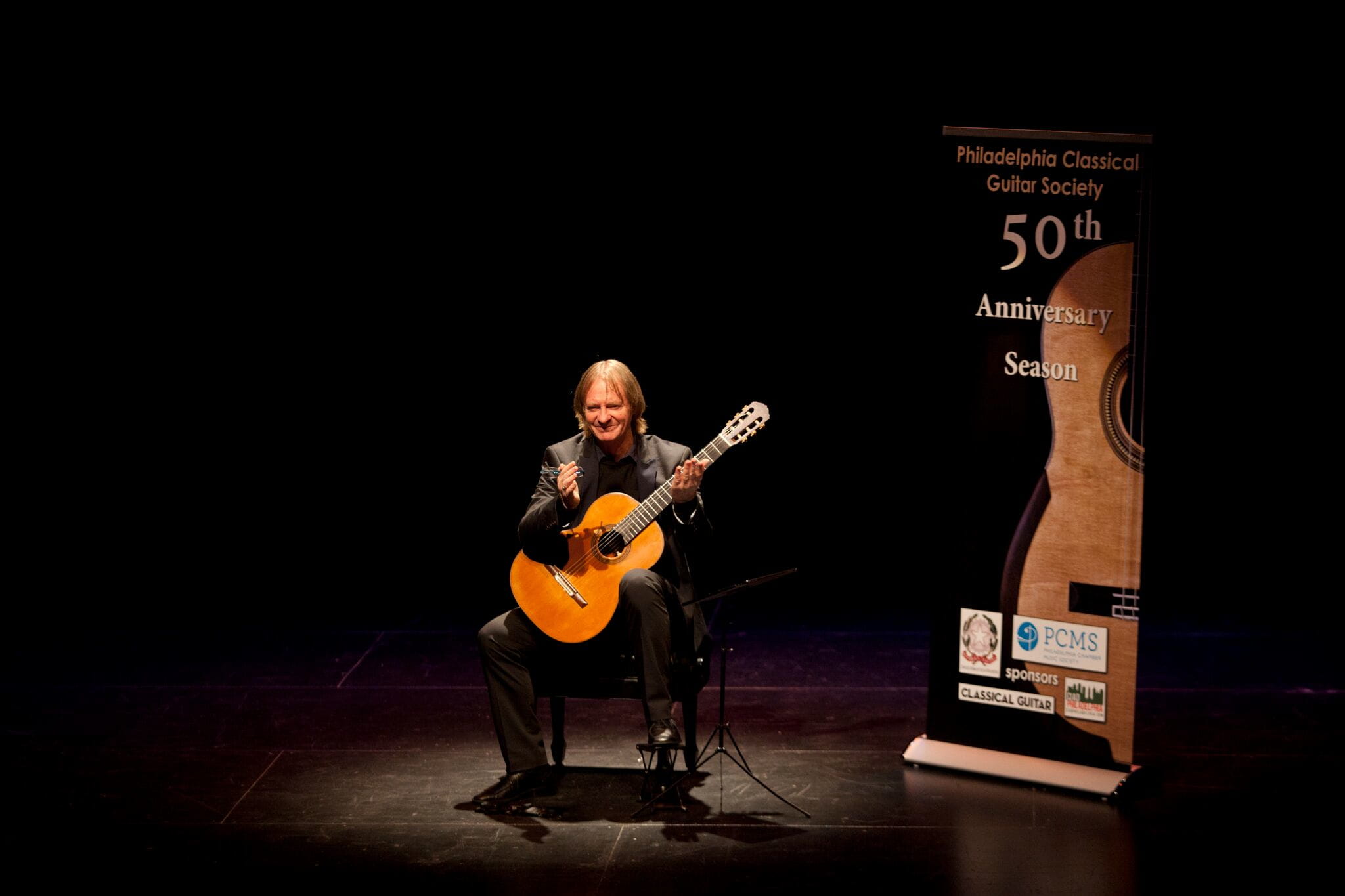 Classical guitarist David Russell playing at Drexel University's Mandell Theater this past spring, which Zillmer helped make happen. 