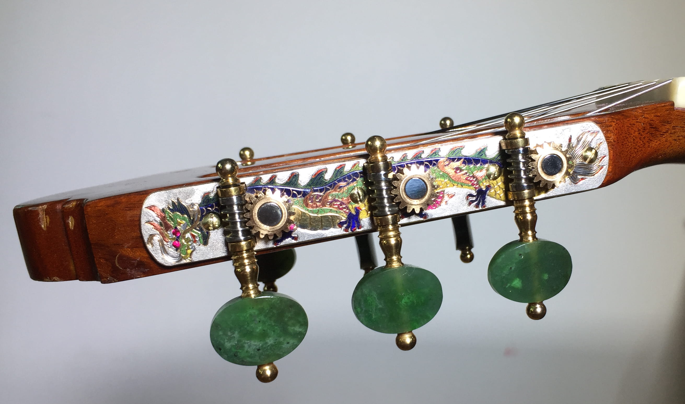 Zillmer retrofitted this flamenco guitar with special custom tuners designed specifically for him — check out the two Chinese-style dragons along with jade tuners.