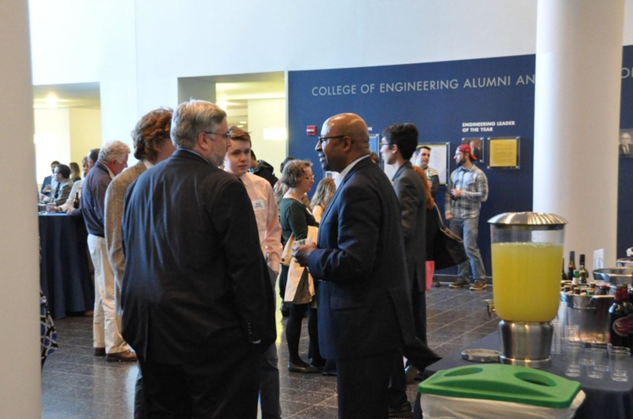 Former Mayor Michael Nutter speaking with guests before the event.