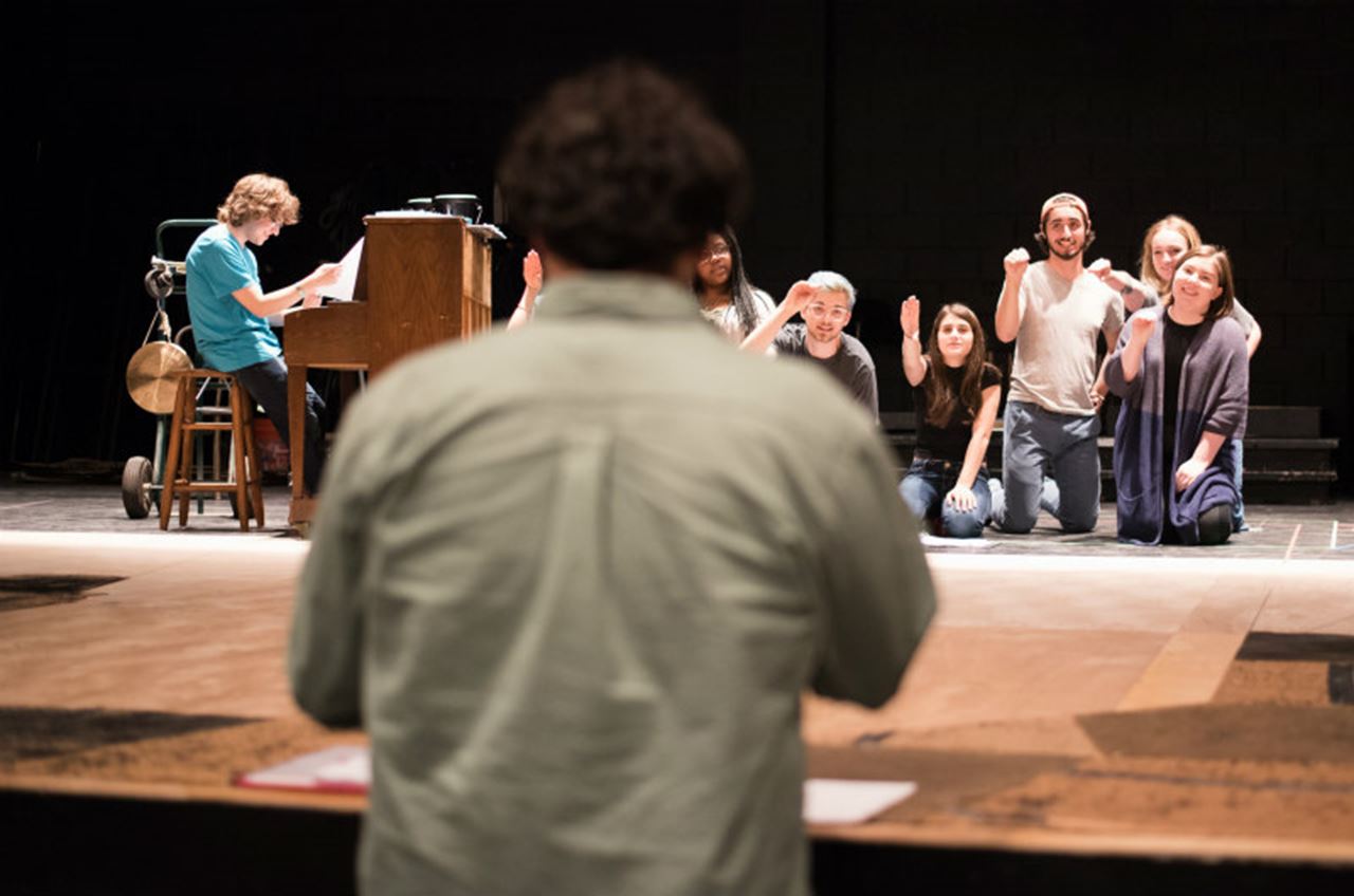 Geo Decas O'Donnell of CollaborationTown instructs the "Mutant Water Babies" cast. Photo by William McKeown.