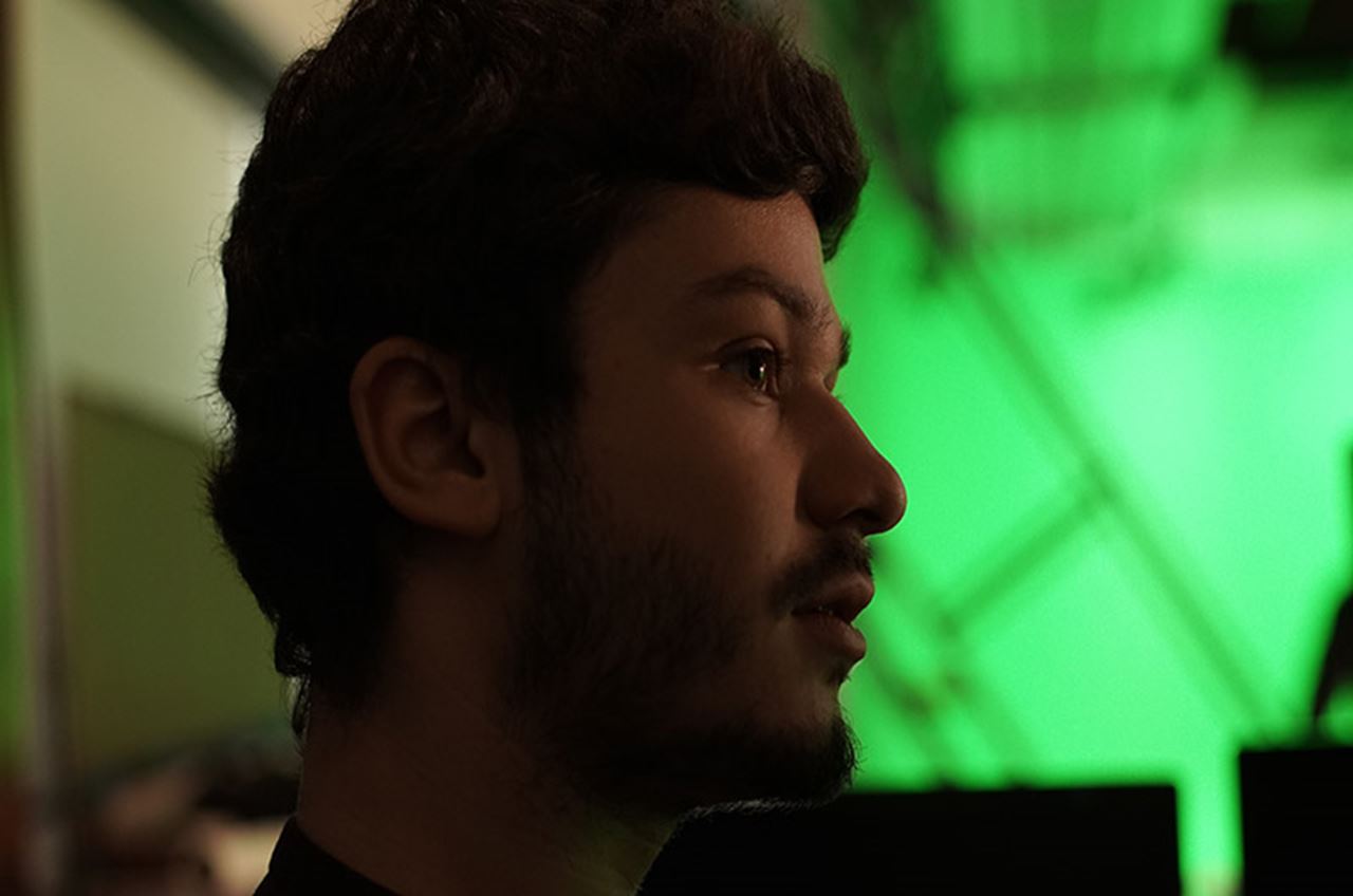 Tristan Alan on set for virtual scenes of “Tribute.”