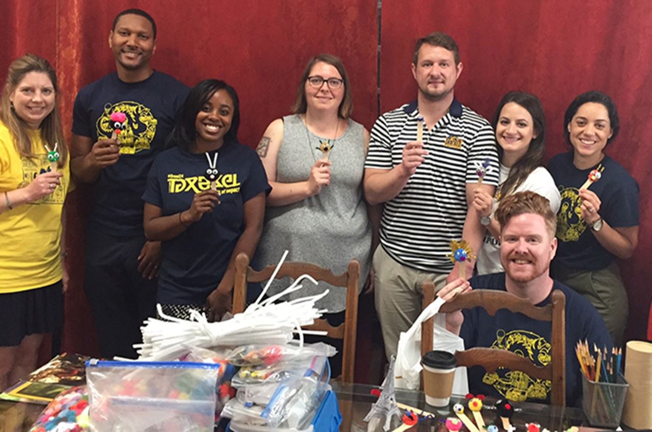 Drexel Admissions professional staff volunteering at Arts Sphere, Inc.