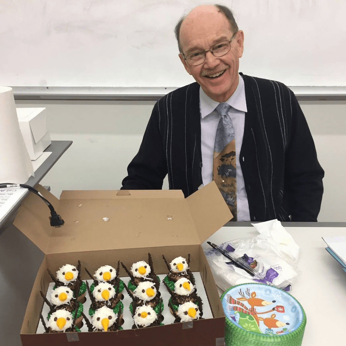 James Spotila, PhD, L. Drew Betz Chair Professor in the College of Arts and Sciences’ Department of Biodiversity, Earth & Environmental Science, with the Eagles cupcakes he brought to his “Endangered Species Conservation” class.
