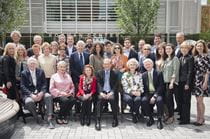 Photo of the 27 members of the Korman family in from of the Korman Center