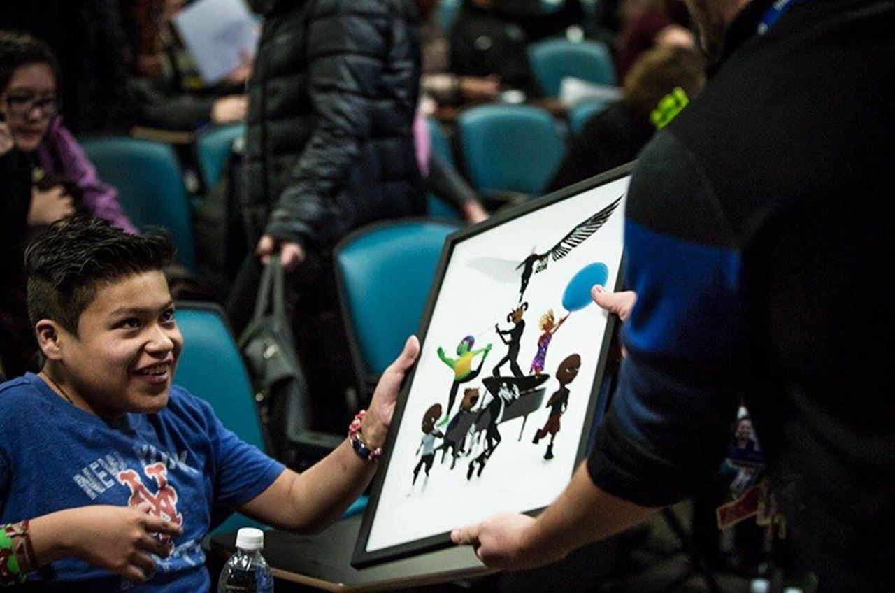 Jose receiving a special plaque at the screening held on Drexel's campus.