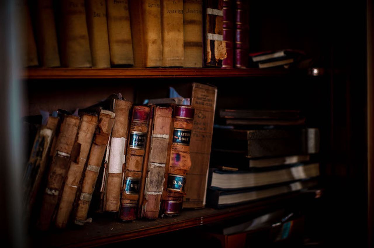 Old minute books from the Bachelors Barge Club of yesteryear are stored in David Florio's living room of the Button.