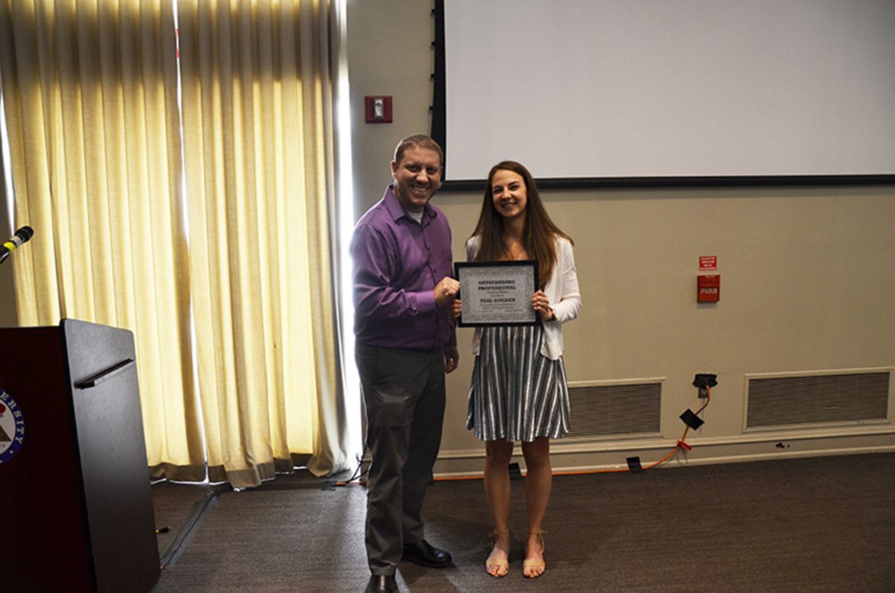 Dane Zdunowski, senior academic advisor in the College of Enigineering, with Teal Golden. Zdunowski presented Golden with the Outstanding Professional Advisor Award.