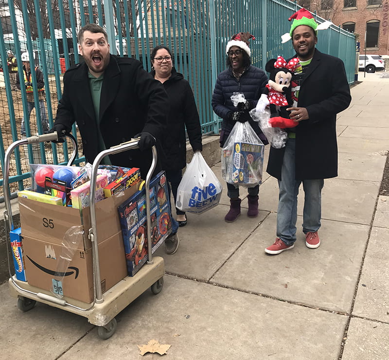 Members of the Procurement Services team participating in Drexel's annual Holiday Toy Drive.