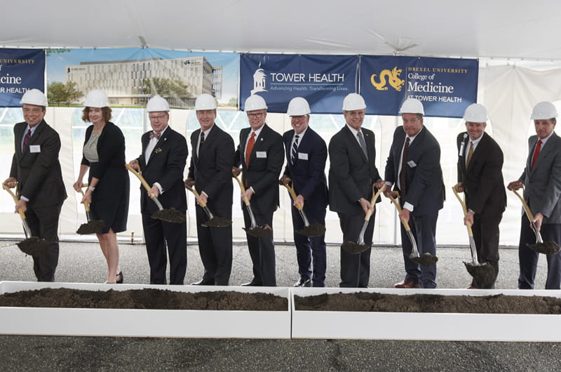 Photo of Drexel and Tower Health officials with shovels at the ceremonial groundbreaking