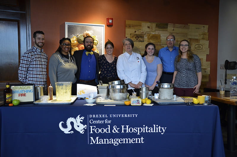 The students and the judges. From left to right: Jim Burke, Toni Hicks, Eric Berley, Nora Vaughan, Daphne Macias, Katelyn Comerford, Michael Tunick and Bridget Heeney.