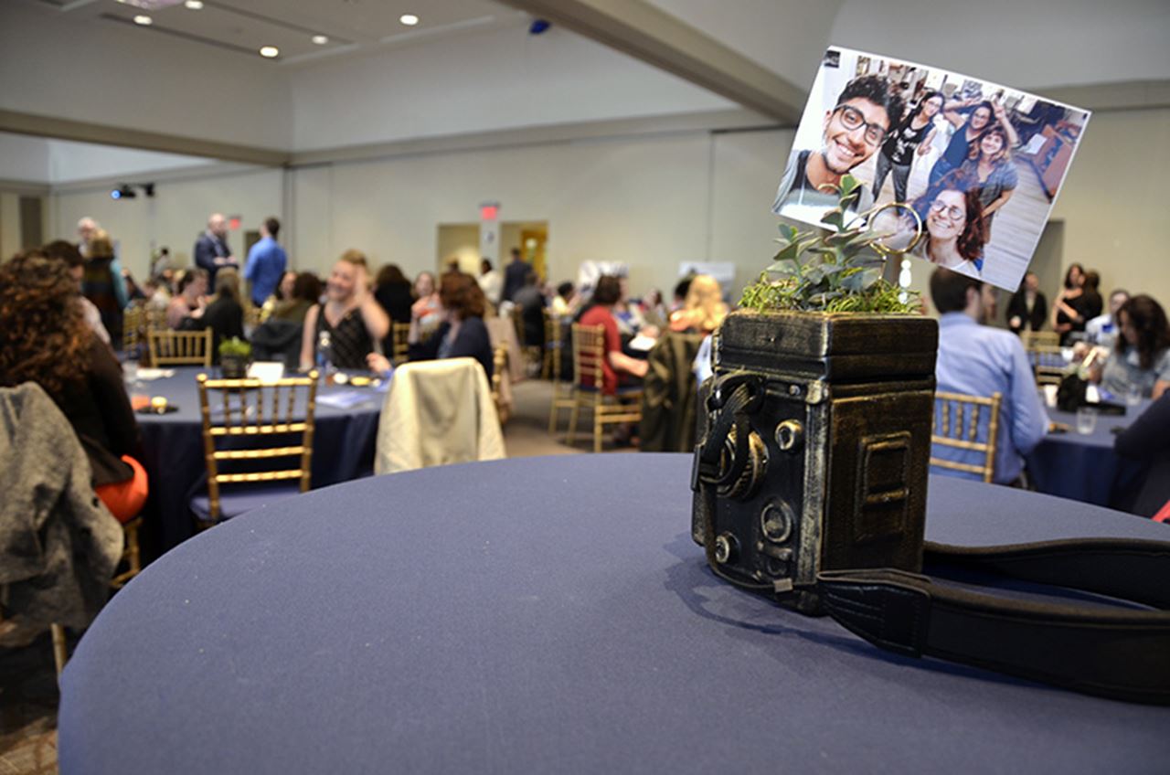 Winning entries of the Steinbright Co-op Photo Contest serve as decorations for the Cooperative Education awards each year.