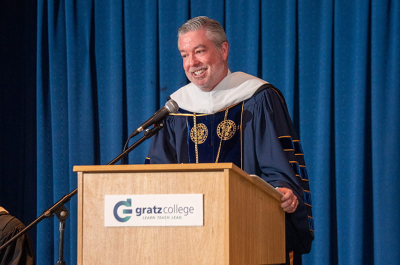 Drexel University President John Fry speaking at the 2019 Gratz College commencement ceremony.