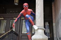 Drexel Spidey poses outside of the Main Building on Drexel's University City Campus.