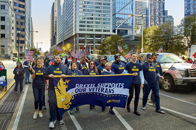 Drexel Dragons participating in the Philadelphia Veterans Parade in 2018.