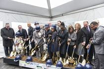 Members and partners in the SLAMS/Powel facility initiative break ground